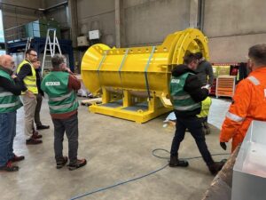Team reviewing the final result of The Pile Catcher before transportation.