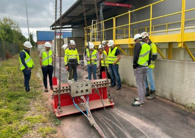 Experts looking at Multistring conductor waterjet cutting