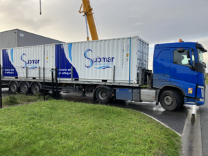 Submar truck transporting cutting equipment for a triple cutting system.